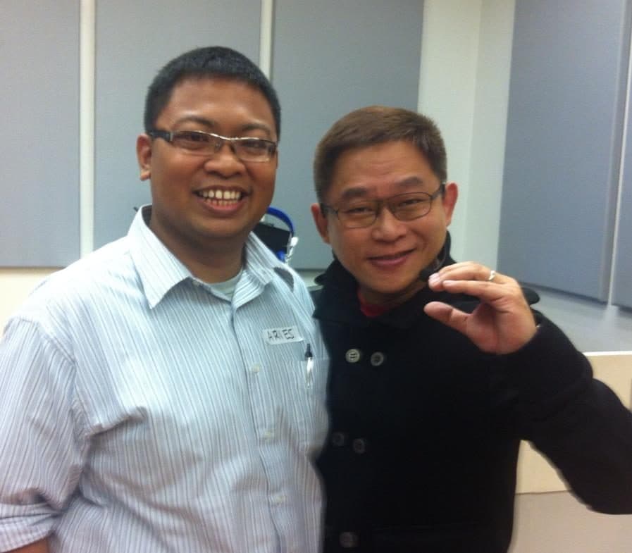 Kuya Aries with a colleague at the Sun Life Grepa office